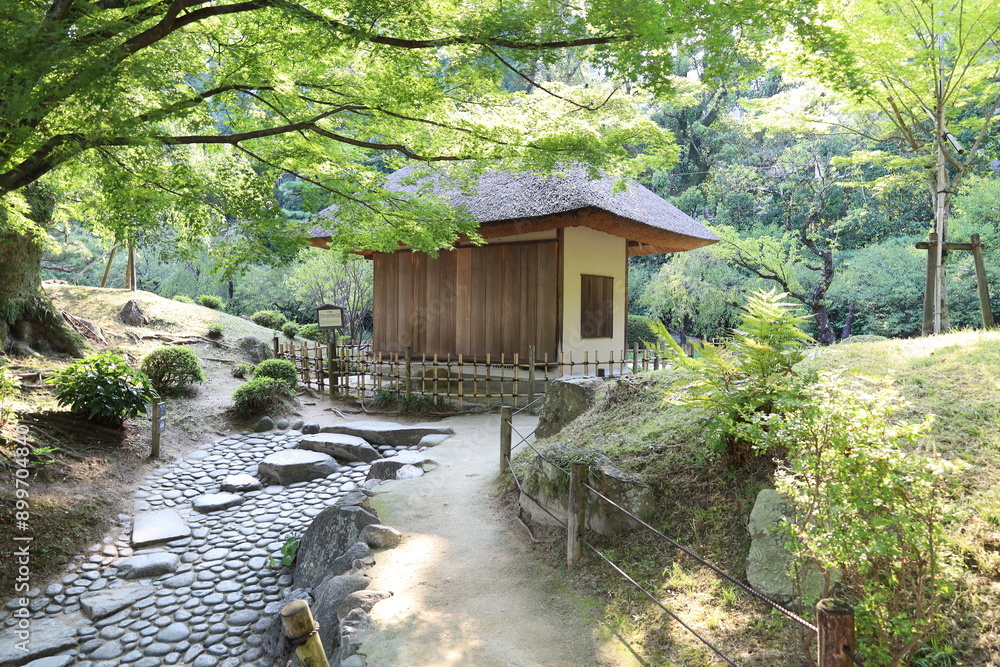 A Japanese garden : the scene of a teahouse in Shukkei-en Garden in Hiroshima City in Hiroshima Prefecture A Japanese garden : the scene of a teahouse in Shukkei-en Garden in Hiroshima City in Hiroshima Prefecture