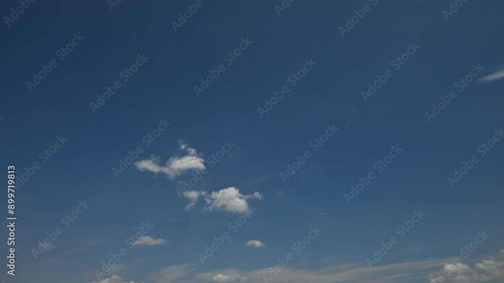 Time lapse, small clouds form and disappear in the of a summer day in Germany Time lapse, small clouds form and disappear in the of a summer day in Germany
