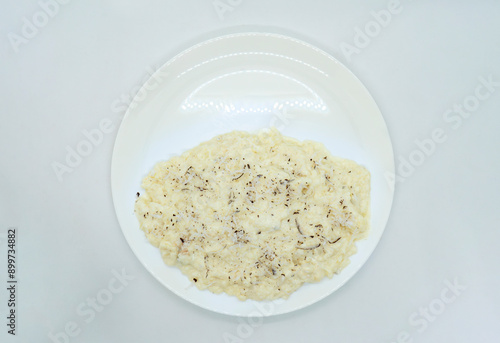 A Plate of Rice Pudding Kheer Khir Coconut Milk Rice Shrawan 15 Khir Khane Din with Coconut Powder photo