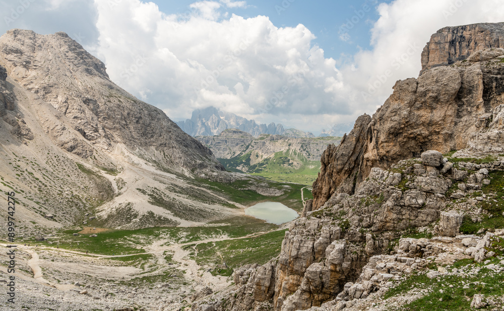 Awesome landscape, Italian Dolomites. Hiking trail from Büllelejochhütte, rifugio pian de cengia. Majestic landscape, mountain lake. Active summer vacation. Healhty lifestyle. Amazing nature.