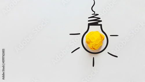 Yellow crumpled paper light bulb drawn on a white background. Brainstorm and creative idea, concept. Project and startup. Every thing begins with Idea