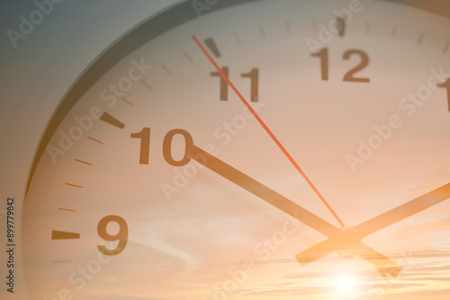 Fotografie Times Clock Face Overlay Double Exposure With Evening Summer Sky For Day Time Business Time Concept