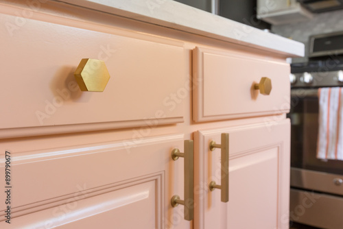 pink painted cabinets with high end brass hardware - modern contemporary painted cabinetry in the kitchen