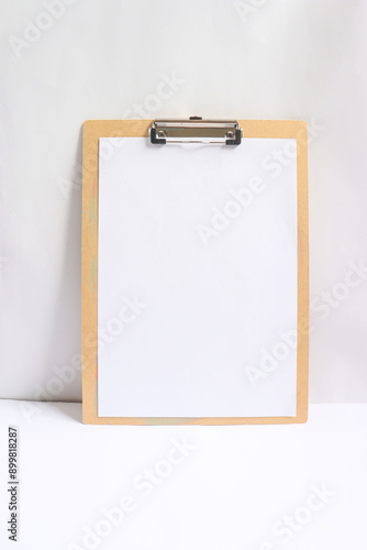 blank clipboard with blank paper