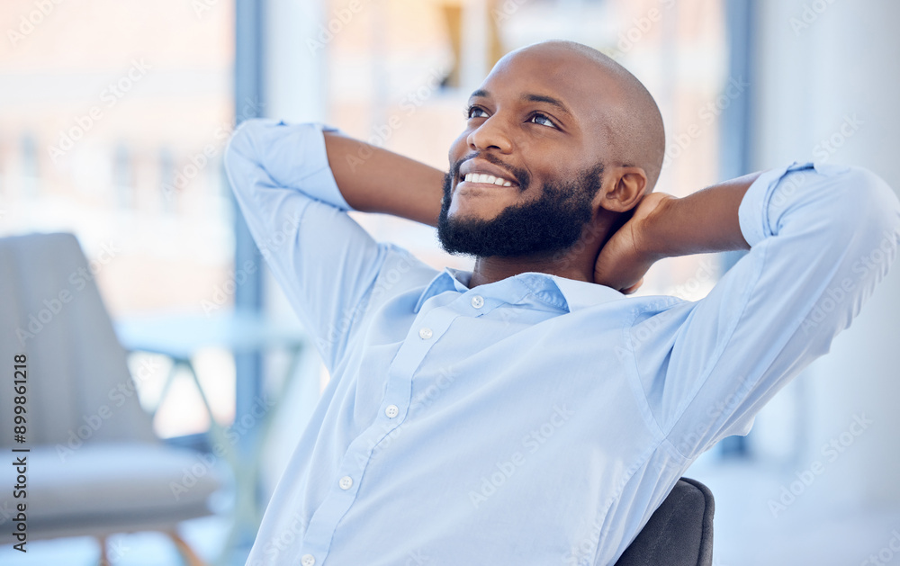 Calm, relax and happy black man in office after finishing work project, planning or complete job in business. Peace of mind, stretching and employee resting for freedom, dream and thinking of future Calm, relax and happy black man in office after finishing work project, planning or complete job in business. Peace of mind, stretching and employee resting for freedom, dream and thinking of future