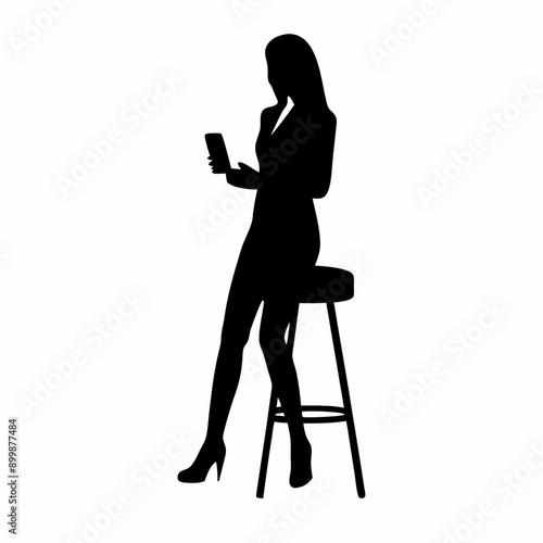 silhouette of a woman sitting on a chair