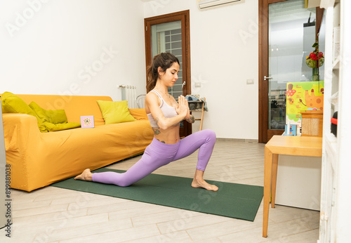 Woman Practicing Yoga in Cozy Living Room