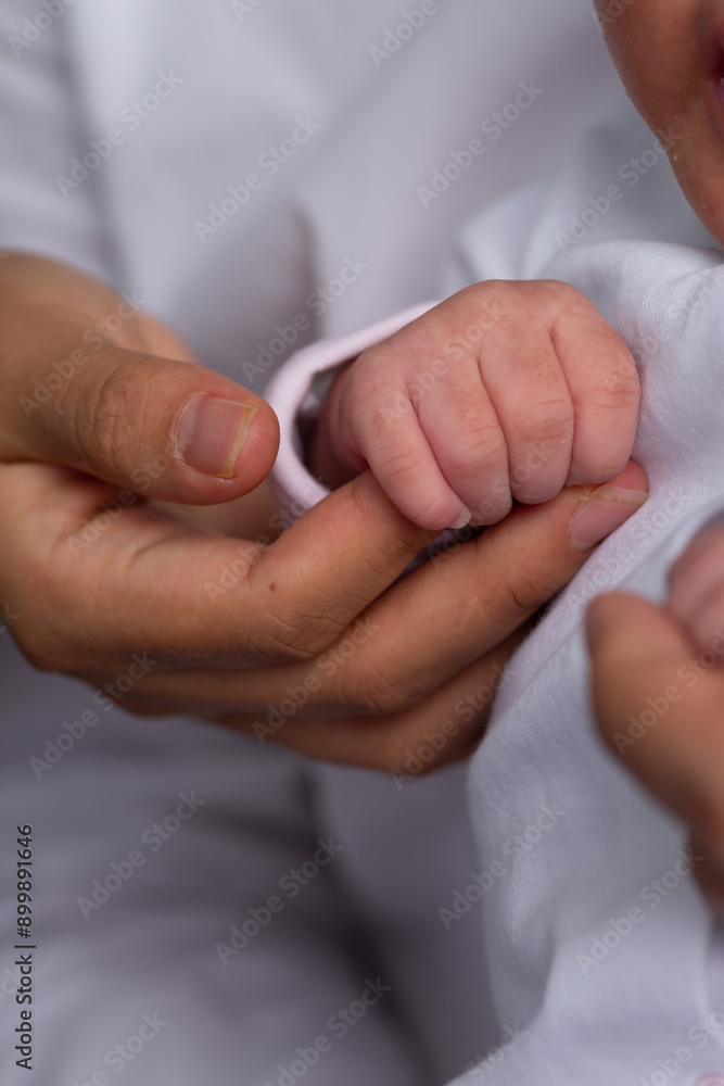 Little feet and hands and head Newborn baby body part details close up Little feet and hands and head Newborn baby body part details close up