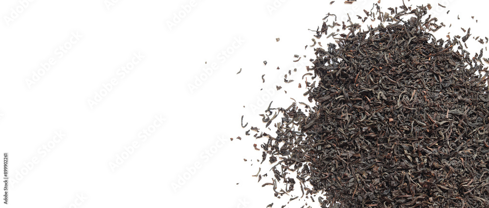 Black long tea on a white background. Top view of dried tea leaves. Tea composition. Ingredients for a hot drink, close-up. Background. Presentation of the type and variety of tea Black long tea on a white background. Top view of dried tea leaves. Tea composition. Ingredients for a hot drink, close-up. Background. Presentation of the type and variety of tea