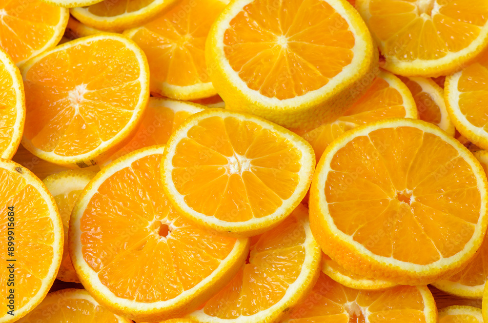 Slices of citrus fruit on cutting board Slices of citrus fruit on cutting board