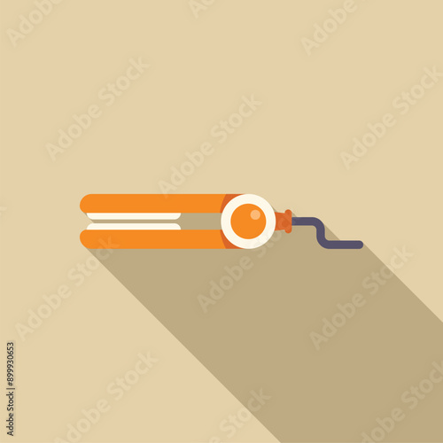 Orange hair straightener is lying on a beige background with a long shadow