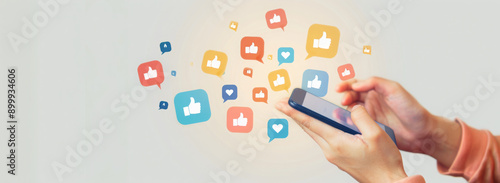 Social media and digital online communication concept, man using smartphone with likes icons on social media. Banner background.