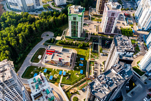 Aerial view of a modern residential area with high-rise buildings and a courtyard