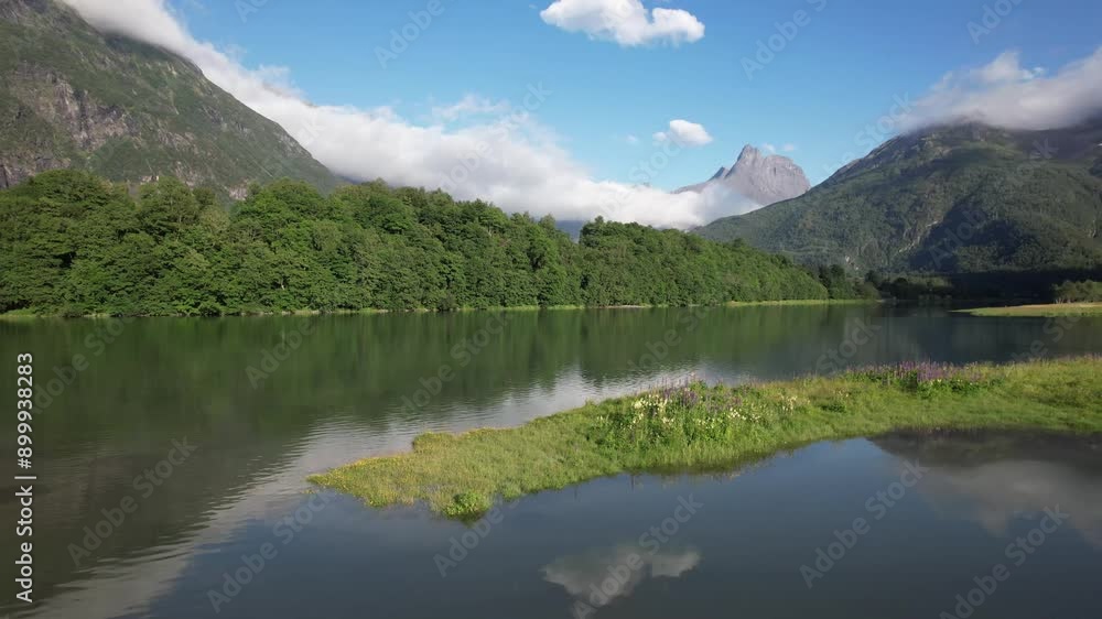 drone aerial view of vengedalen valley in rauma in alndalsnes in summer with stream and lake drone aerial view of vengedalen valley in rauma in alndalsnes in summer with stream and lake