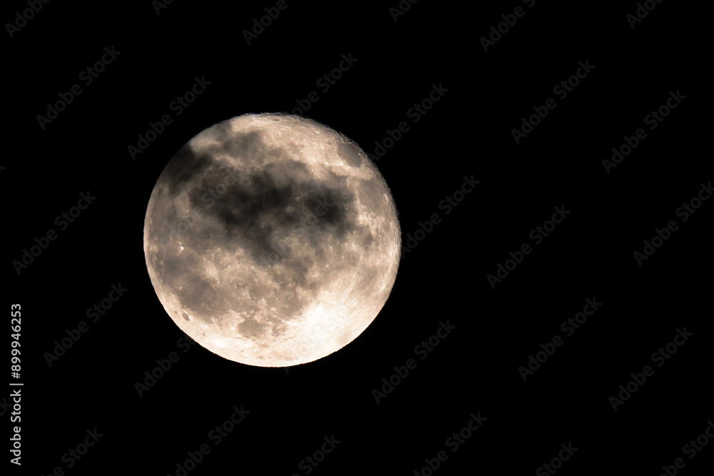 Fototapeta premium Full moon in the cloudy night sky