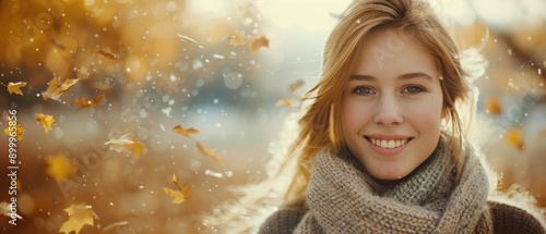 Woman Smiling in Autumn Leaves