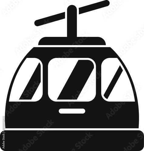 Black silhouette of a funicular cabin moving up a mountain cableway