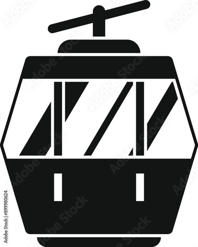 Black silhouette of a cable car cabin taking people up a mountain