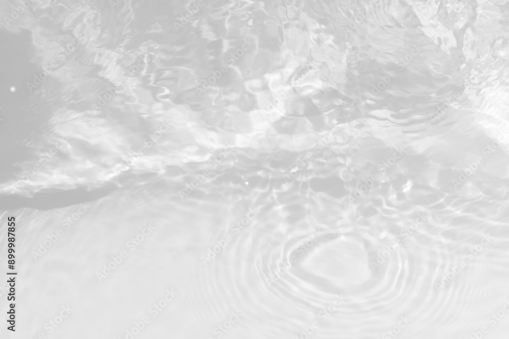 White water with ripples on the surface. Defocus blurred transparent white colored clear calm water surface texture with splashes and bubbles. Water waves with shining pattern texture background. White water with ripples on the surface. Defocus blurred transparent white colored clear calm water surface texture with splashes and bubbles. Water waves with shining pattern texture background.