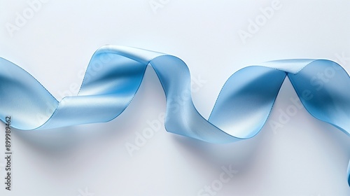 Elegant Blue Ribbon Curving Gracefully on a White Background