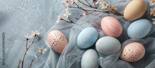 Easter eggs arranged on tex...