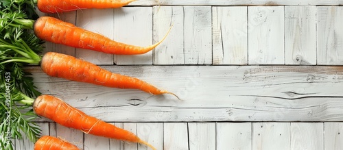 Fresh carrots arranged on a...