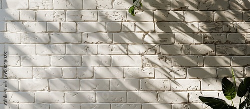 A white brick wall provides...