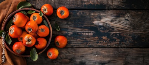 Bowl of autumn persimmons o...