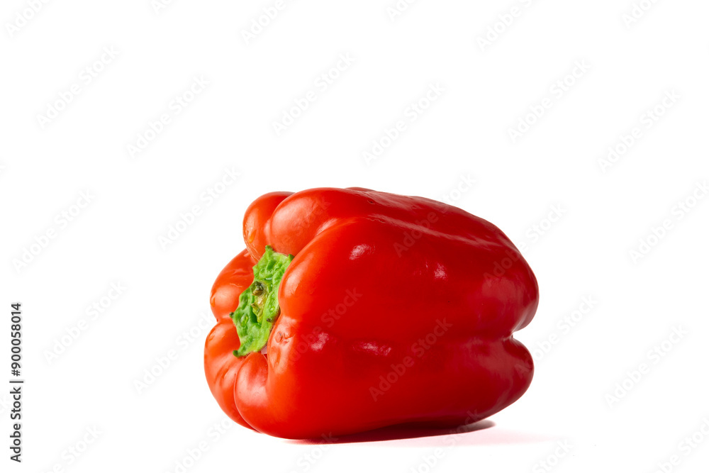 One whole bell pepper. Red, fresh, juicy, fleshy and crispy bell pepper. Close up on a white background One whole bell pepper. Red, fresh, juicy, fleshy and crispy bell pepper. Close up on a white background