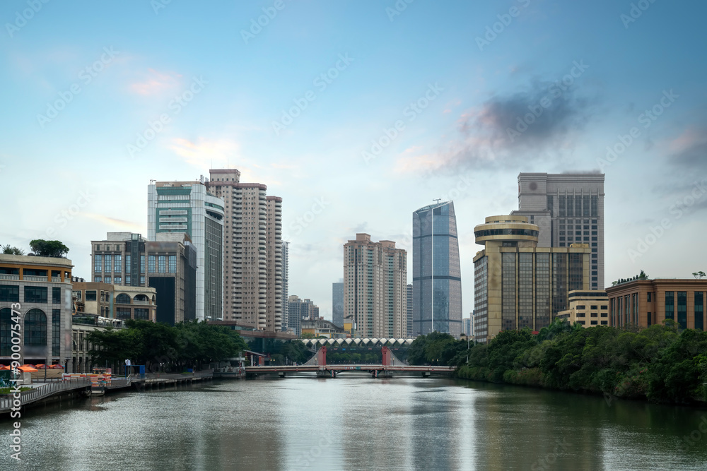 Serene Urban Landscape with River and Skyscrapers at Dusk Serene Urban Landscape with River and Skyscrapers at Dusk
