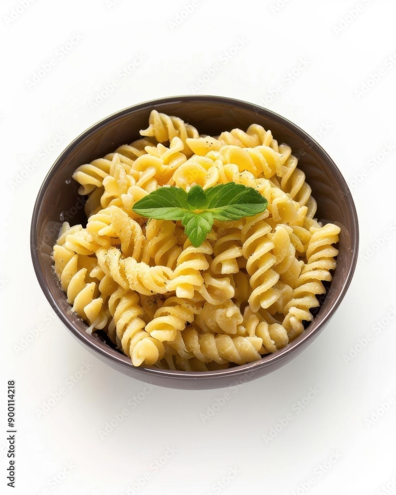 A bowl of pasta with a sprig of mint on top. A bowl of pasta with a sprig of mint on top.