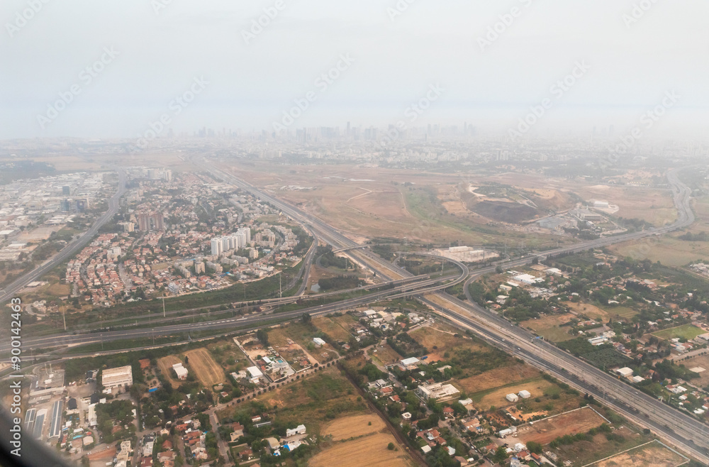 A Smart Wings plane flies early in morning over Tel Aviv city Israel A Smart Wings plane flies early in morning over Tel Aviv city Israel