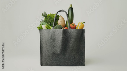 Frontal view of groceries inside gray felt shopping bag. AI generative. photo