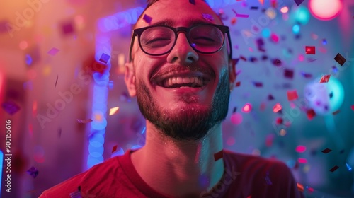 A handsome young man, short shaved hair and short beard, he is wearing a burgundy t-shirt and square black glasses, he is happy, AI Generative