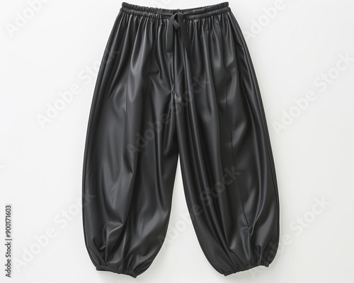 Stylish black pants with an elastic waistband, perfect for casual wear or street fashion. photo