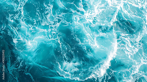 Pure blue turquoise water texture of the ocean sea with foam from and waves