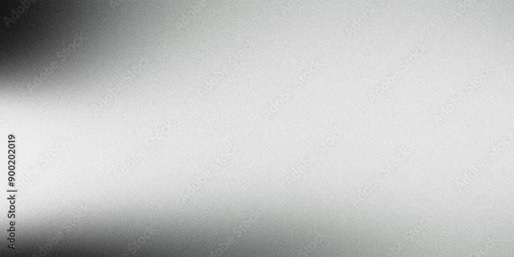 Metallic silver surface with a grainy texture reflecting light Metallic silver surface with a grainy texture reflecting light