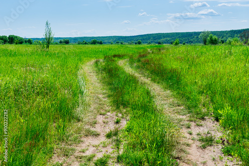 the track left by the wheels of vehicles on an agricultural field