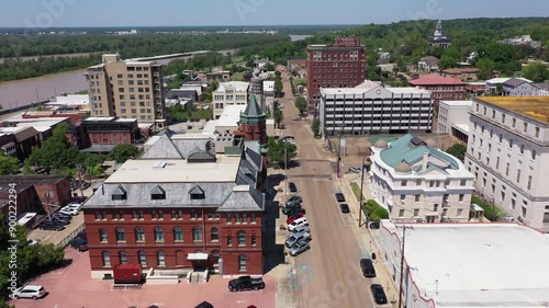 Vicksburg, Mississippi, USA - April 23, 2024: Afternoon sun shines on the historic buildings of downtown Vicksburg. photo