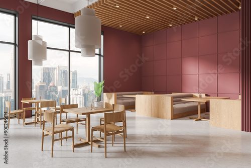 Photography Red cafeteria interior with eating tables and soft place, panoramic window