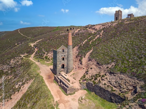 Aerial view of the historic mine buildings of St Agnes on the rugged coastline of Cornwall, England photo