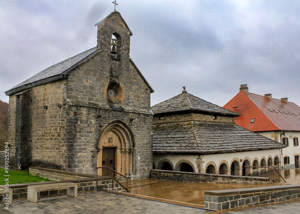 Fototapeta premium Charlemagne's silo and the 13th century Gothic church of Santiago in Roncesvalles. Navarre, Spain.