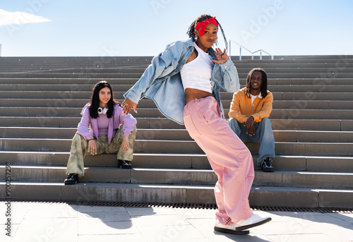 Konstfotografi Young group of multiethnic hip-hop dancers wearing colorful urban streetwear dan