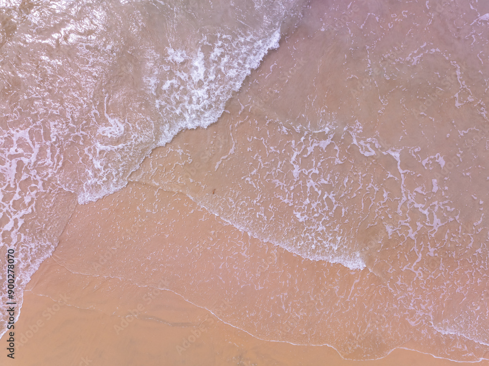 Fototapeta premium Amazing sand on beach in summer season sea background,Aerial view beach for travel background