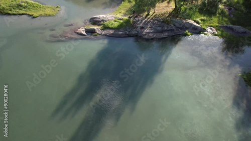 drone aerial view of vengedalen valley in rauma in alndalsnes in summer with stream and lake photo