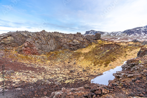 Beautiful landscape of Saxholl Crater volcano crater in winter in Iceland, Snaefellsnes Peninsula © unai