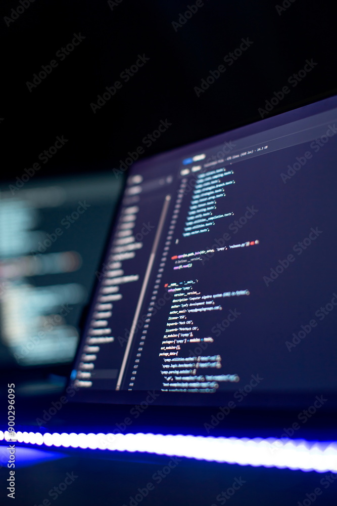 Modern tech. PHP syntax highlighted. Writing programming functions on laptop. Big data and Internet of things trend
