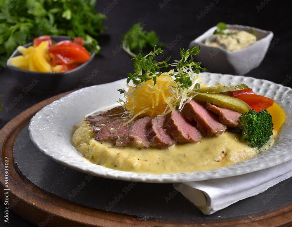 A hearty Czech svíčková with marinated beef and creamy vegetable sauce, traditional czech food, czech cousine dish A hearty Czech svíčková with marinated beef and creamy vegetable sauce, traditional czech food, czech cousine dish