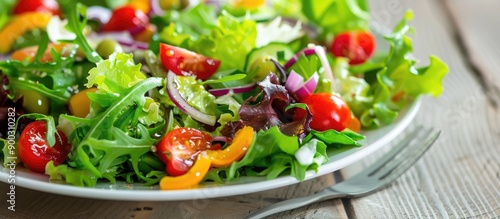 Fresh and Colorful Salad on White Plate © andri