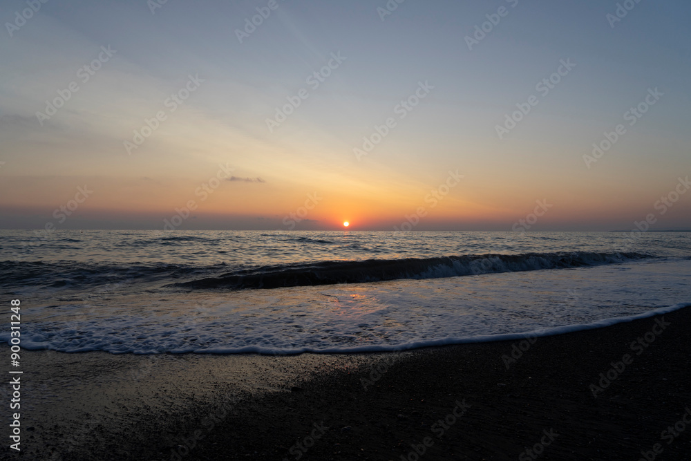 Obraz premium Sunset at the Mediterranean Sea in Marina di Bibbona in Tuscany in Italy